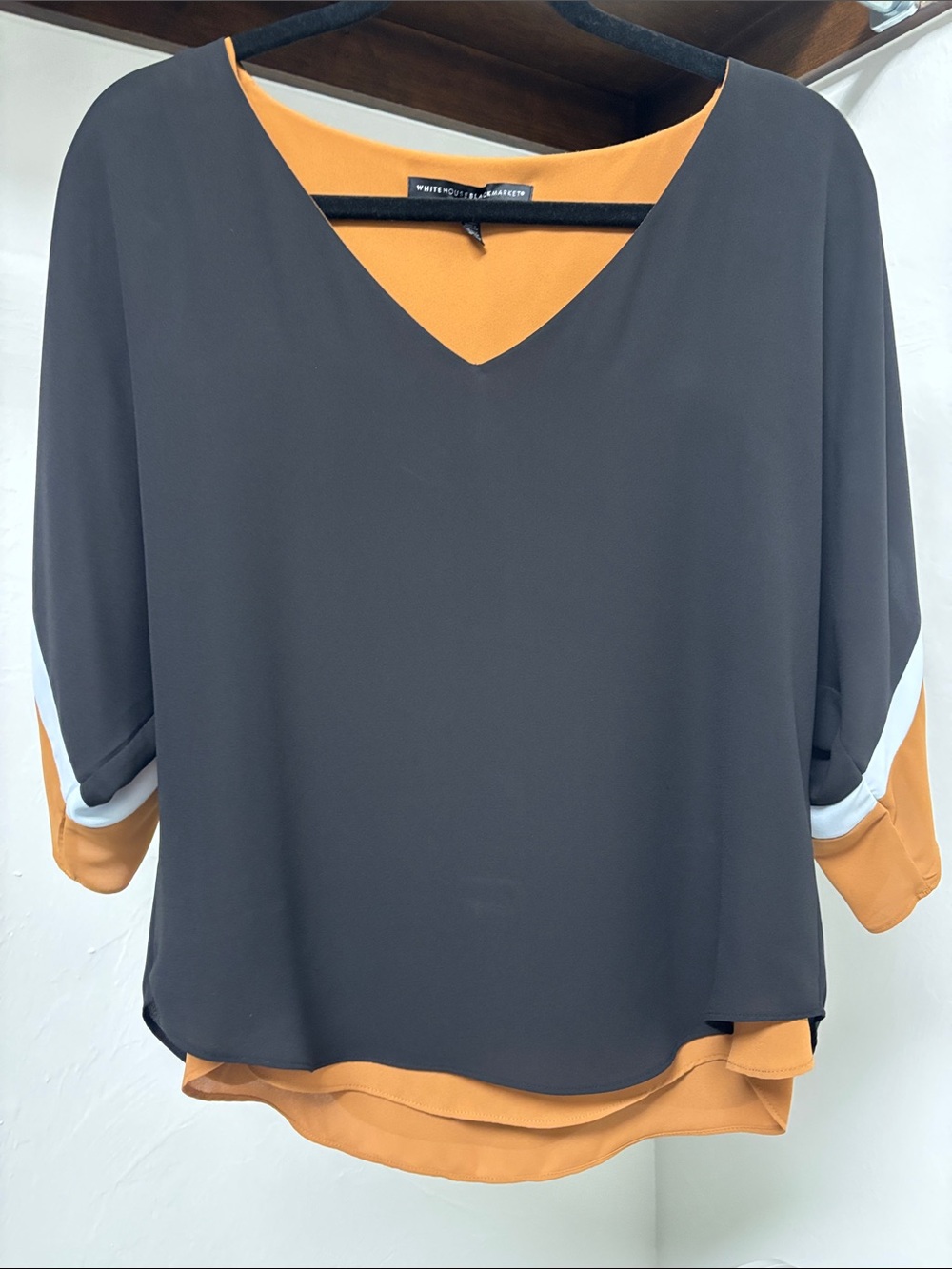 White House Black Market Black Blouse with Mustard Layered Hem